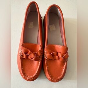 Vibrant Orange Leather Flats with Elegant Knot Detail